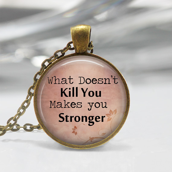 1 Inch Round Pendant Tray - What Doesn't Kill You Makes You Stronger